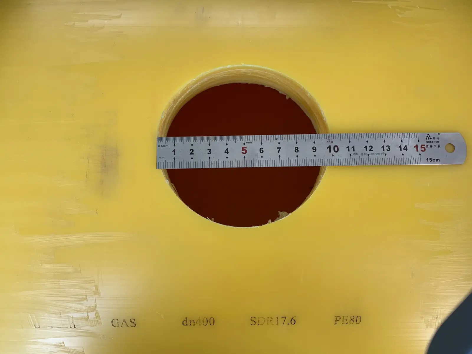 100 mm opening measured with a steel ruler
